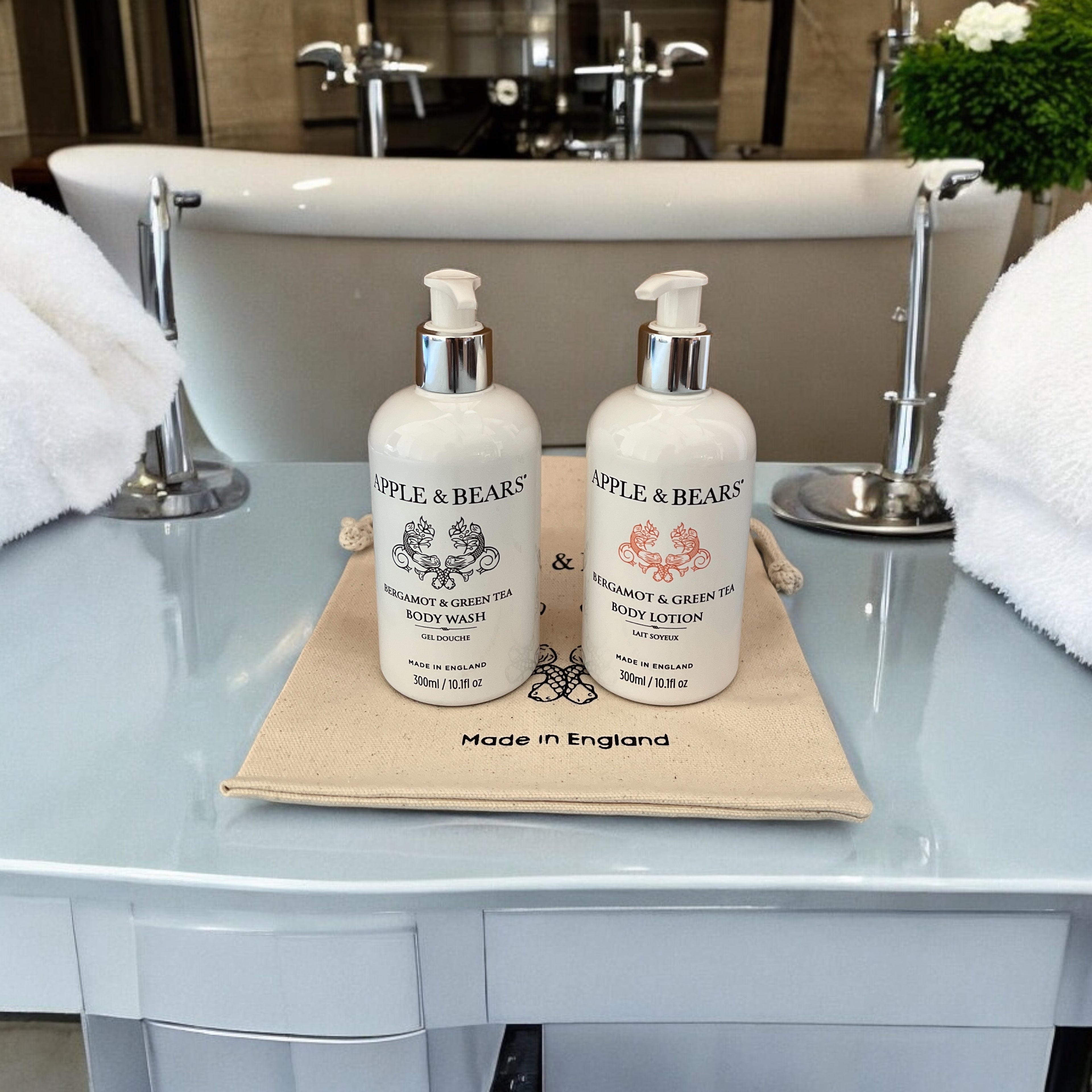 Luxury Bergamot & Green Tea Body Care Set displayed in a premium bathroom setting - Natural body wash and lotion on a signature canvas bag by Apple & Bears.