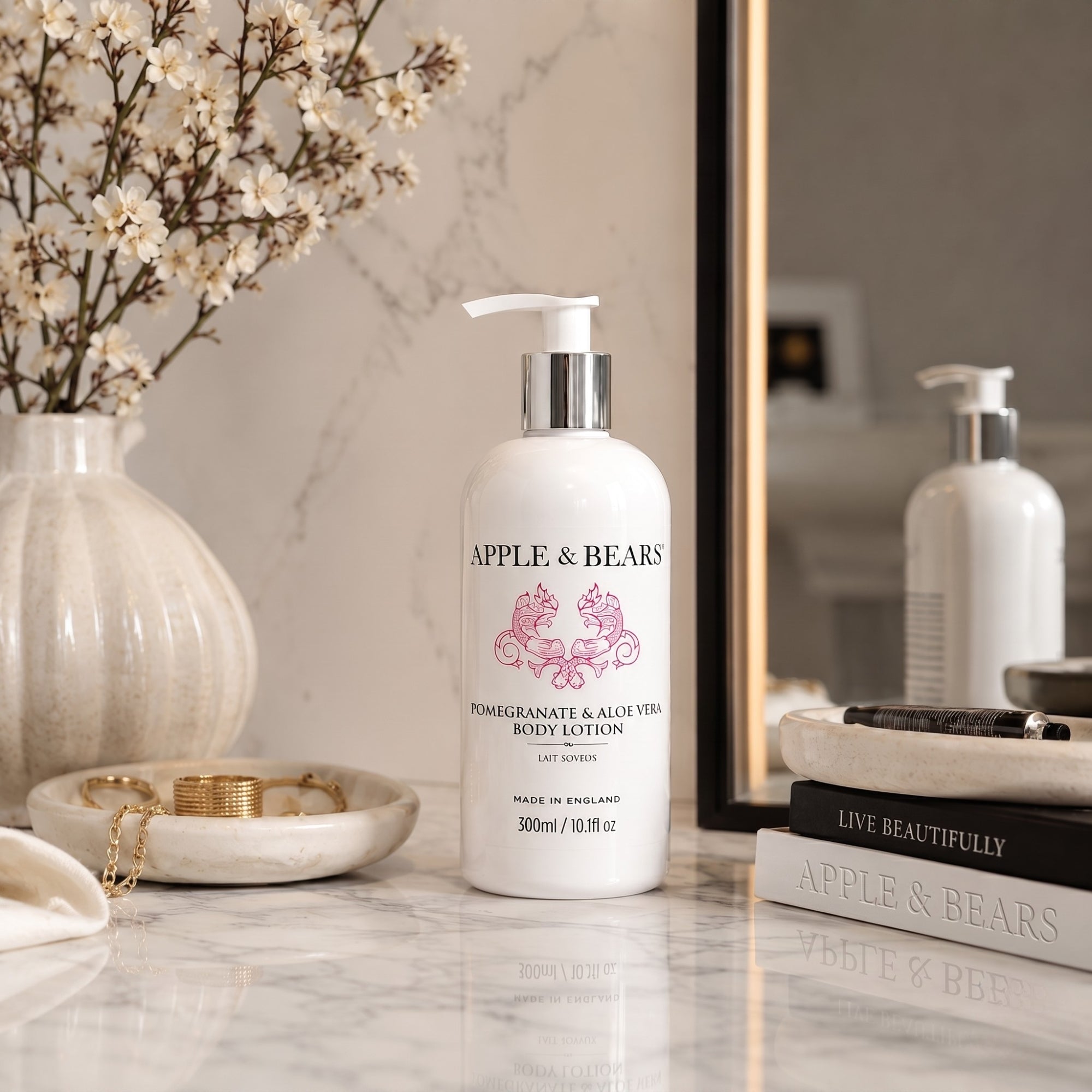 Apple and Bears Pomegranate and Aloe Vera Body Lotion 300ml luxury dark editorial lifestyle with botanicals made in England