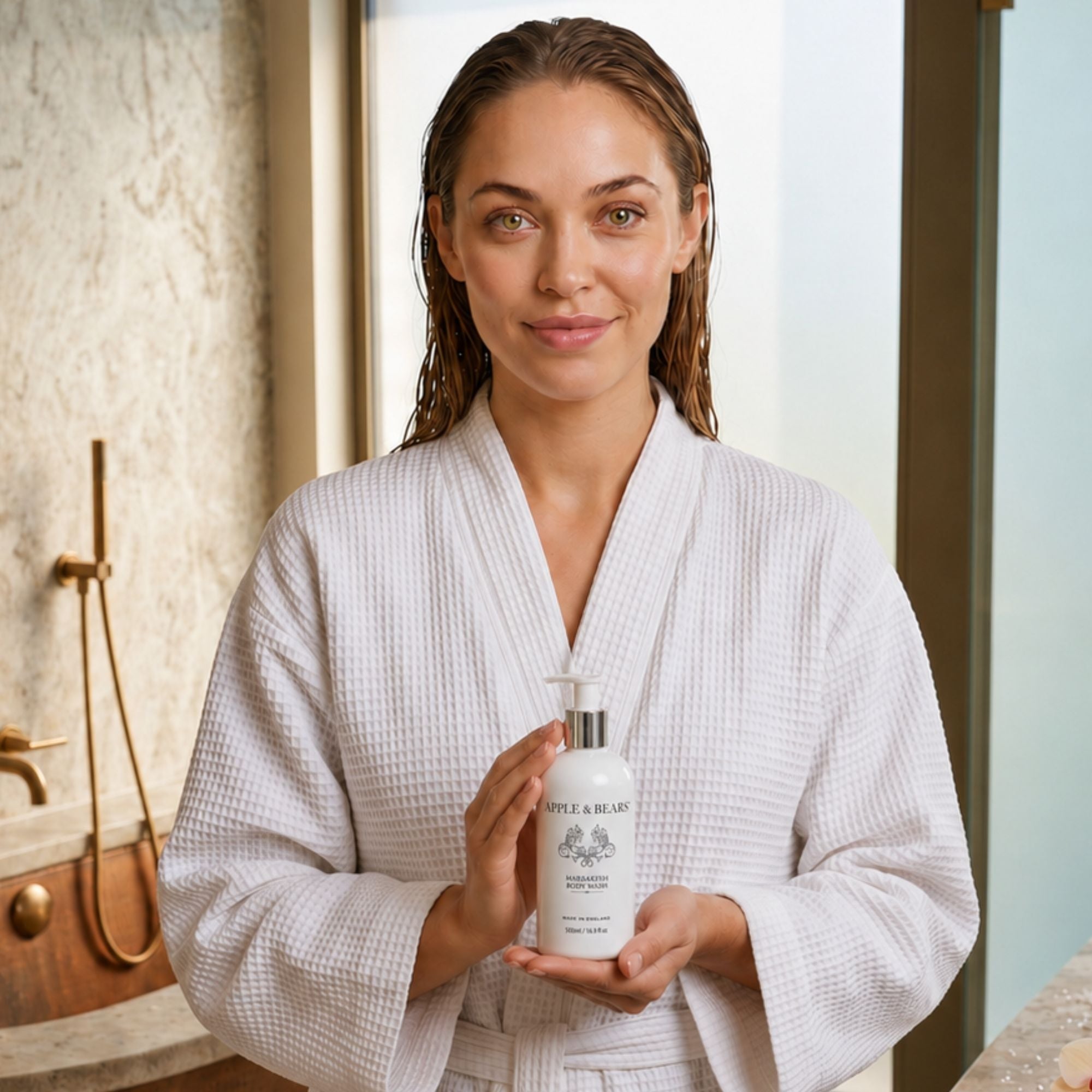 Marrakesh body wash 500ml woman in bathrobe holding bottle – Apple & Bears