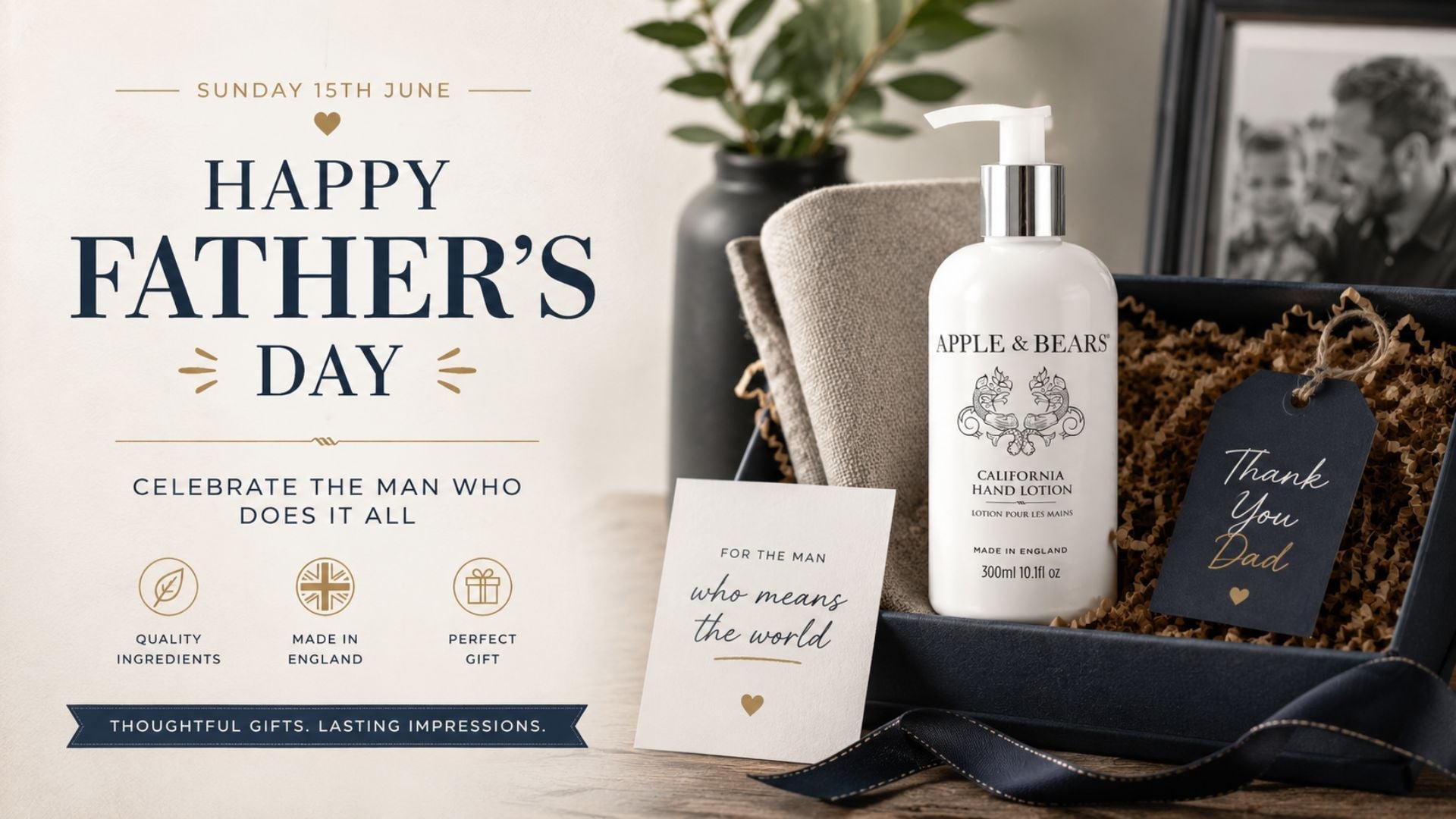 An Apple and Bears premium luxury Father's Day skincare gift box featuring California Hand Lotion styled beautifully with a grey linen towel, a custom thank you card, and elegant dark blue satin ribbons.