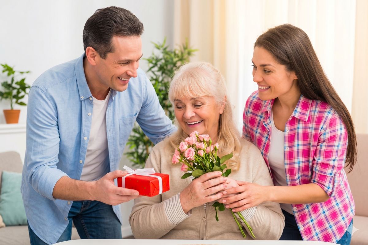 A son and daughter surprising their mother with a gift and flowers on Mother's Day — Apple and Bears luxury pamper gift sets make the perfect present.