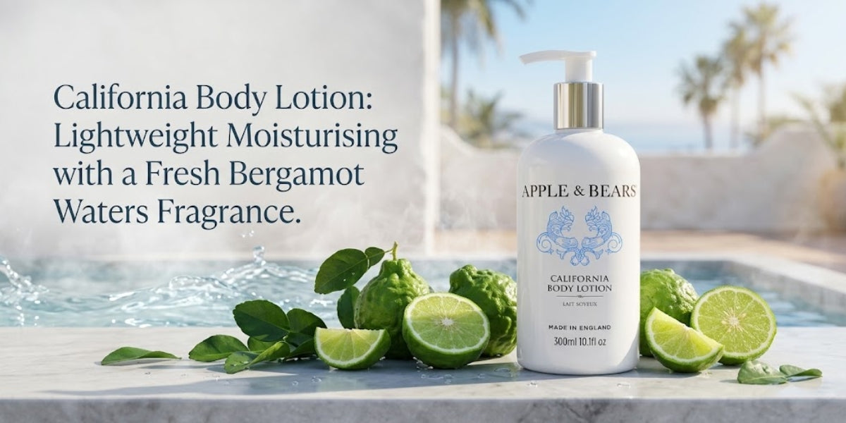 APPLE & BEARS California Body Lotion 300ml with fresh bergamot fruit on a marble surface — lightweight body lotion with Bergamot Waters fragrance, made in England.