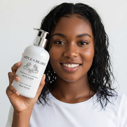 Woman holding Apple &amp; Bears Pomegranate &amp; Aloe Vera Body Wash 500ml — natural, vegan, Made in England

