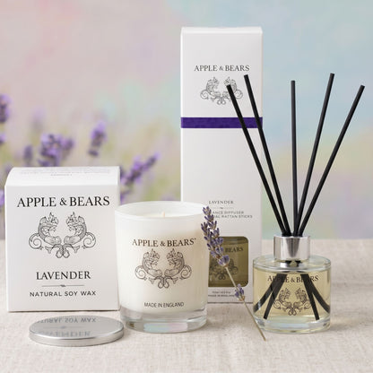 Apple &amp; Bears Lavender Sleep Sanctuary Home Gift Set featuring a luxury soy wax candle, 125ml reed diffuser with black reeds, and premium packaging accented with a sprig of fresh lavender.