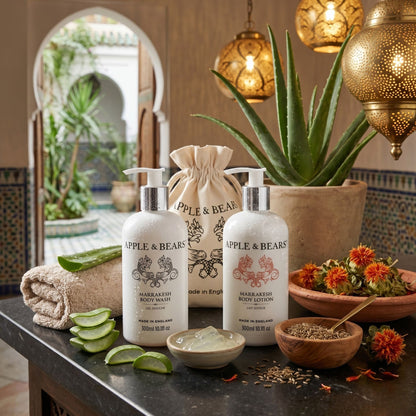 Marrakesh gift set body wash and lotion 300ml lifestyle shot Moroccan flat lay with botanicals – Apple &amp; Bears
