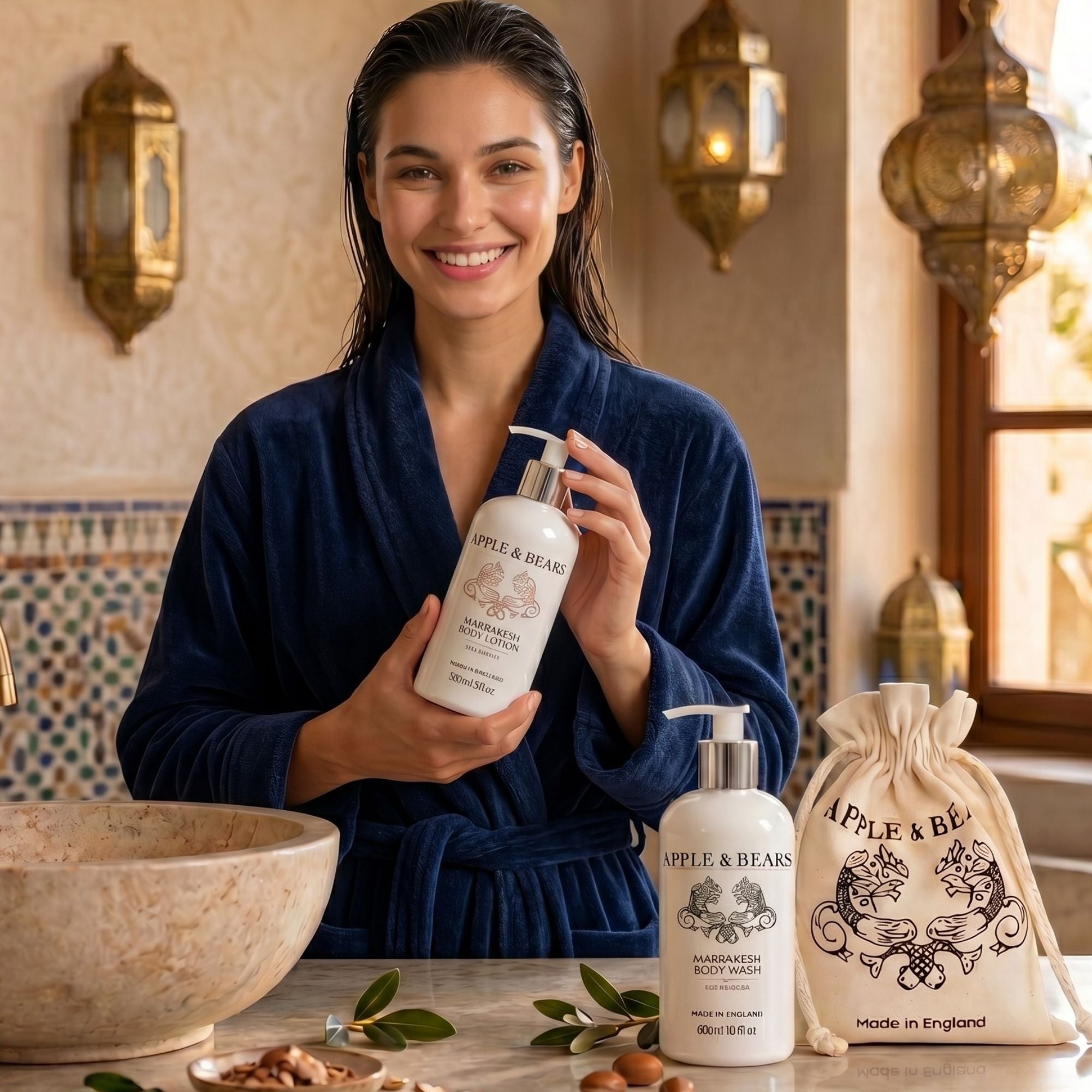 Marrakesh gift set body wash and lotion 300ml lifestyle woman in blue robe holding bottle – Apple &amp; Bears
