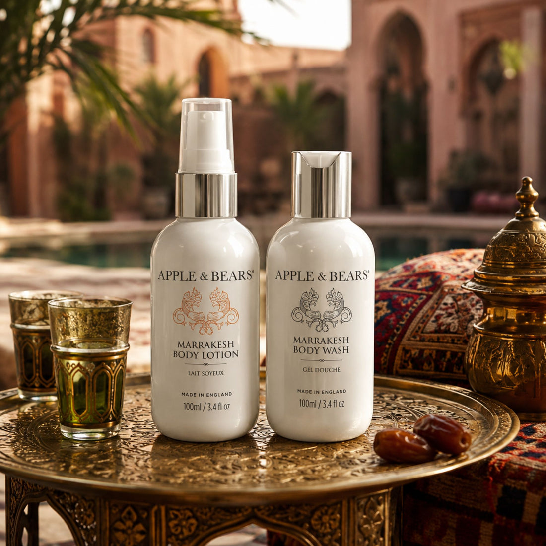 Apple &amp; Bears Marrakesh Body Lotion &amp; Body Wash Travel Gift Set 100ml/3.4 fl oz with eco cotton drawstring bag beside riad courtyard pool with palm trees, Made in England