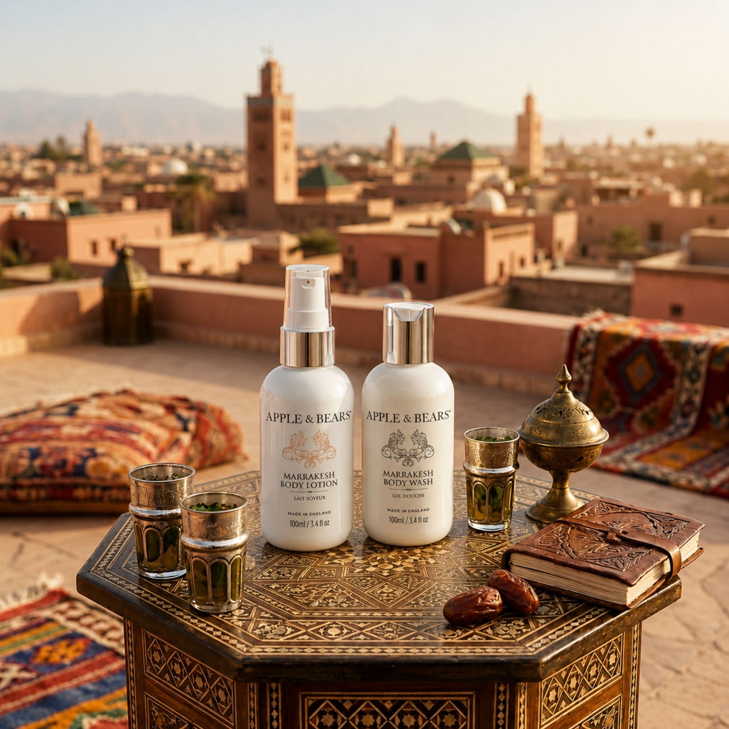 Apple &amp; Bears Marrakesh Body Lotion &amp; Body Wash Travel Gift Set 100ml/3.4 fl oz on Marrakesh rooftop with Koutoubia mosque skyline at golden hour, Made in England