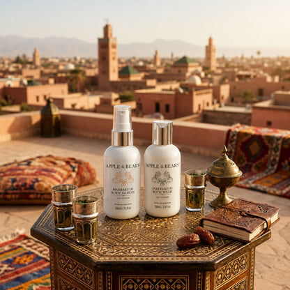 Apple &amp; Bears Marrakesh Body Lotion &amp; Body Wash Travel Gift Set 100ml/3.4 fl oz on Marrakesh rooftop with Koutoubia mosque skyline at golden hour, Made in England
